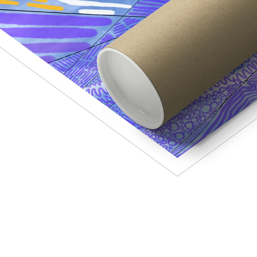 A poster tube laying on top of an art print.