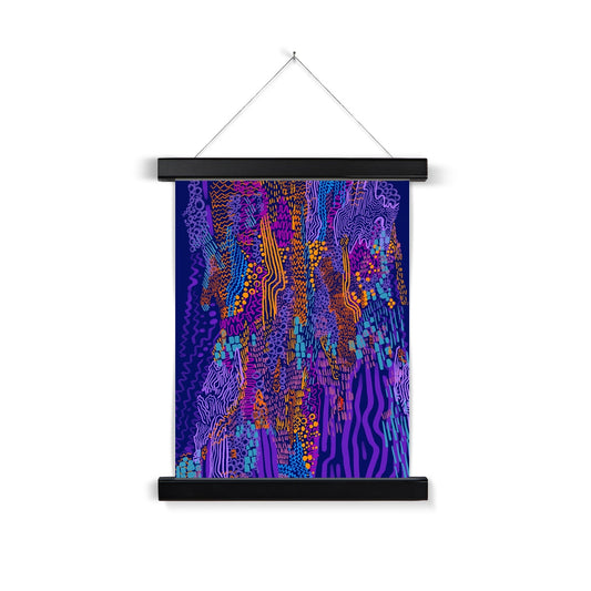 Black wooden poster hanger. The print is an abstract drawing of a tree. It uses circles, squiggles and lines. The background is plain purple and the doodles are in lavender, orange, hot pink and light blue. 