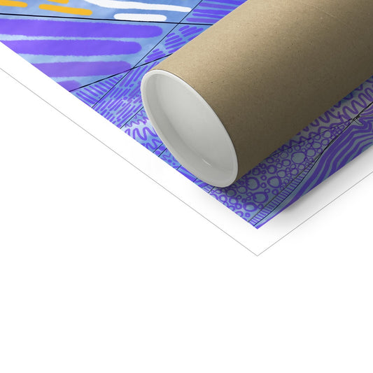 A poster tube laying on top of an art print. 