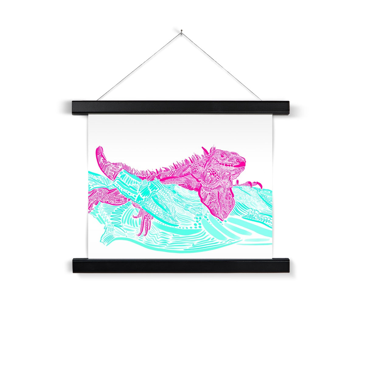 A black wooden poster hanger. The print background is white and the design is an Iguana laying on top of a branch. They are both rendered in lines, squiggles and circles. The Iguana is hot pink and the branch is seafoam green.