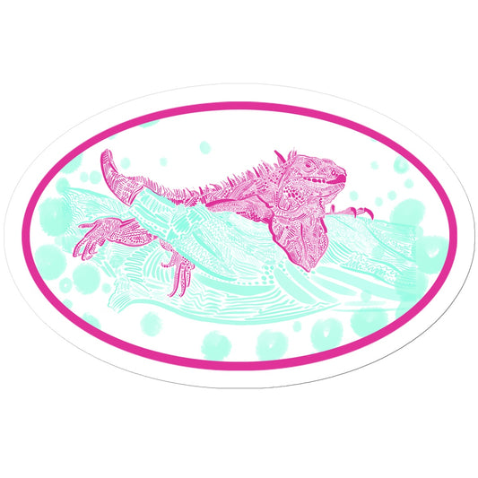 An oval sticker. There is an outer white border with an inner hot pink border. The design: an Iguana laying on top of a branch. They are both rendered in lines, squiggles and circles. The Iguana is hot pink and the branch is seafoam green. Seafoam green circles surround the Iguana and branch. 