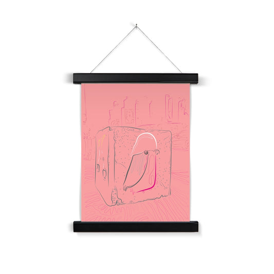 A black wooden poster hanger. The print: a cityscape line drawing in pink. In the centre of the image is a grey cube with a galah in pink/white/grey drawn on it. The print background is plain pink.  